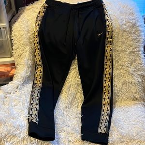 Nike track pants size medium